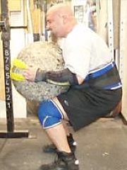 Atlas stone lifting with strap