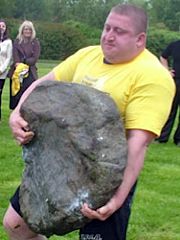 Vladislav Alhazov carrying the Husafell stone at the 2006 Iceland's Strongest Man contest
