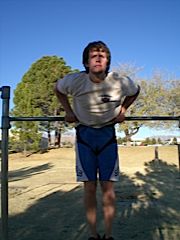 Jason Kirby performing a muscle-up