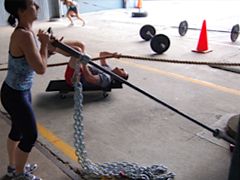 Russian barbell twist with chains