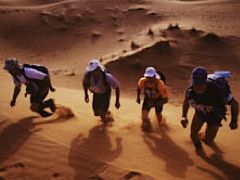 Running over sand dunes