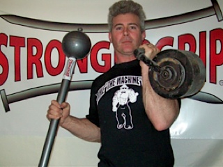 One of my first homemade kettlebells and a StrongerGrip Loadable Mace