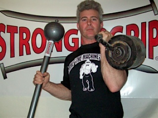 One of my first homemade kettlebells and a StrongerGrip Loadable Mace One of my first homemade kettlebells and a StrongerGrip Loadable Mace